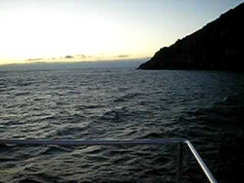 barco finisterre puesta de sol